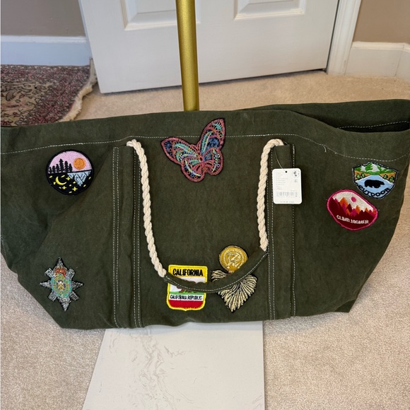 Free People Handbags - NWT Free People Green Canvas Patchwork Rope Strap Duffle Tote Bag